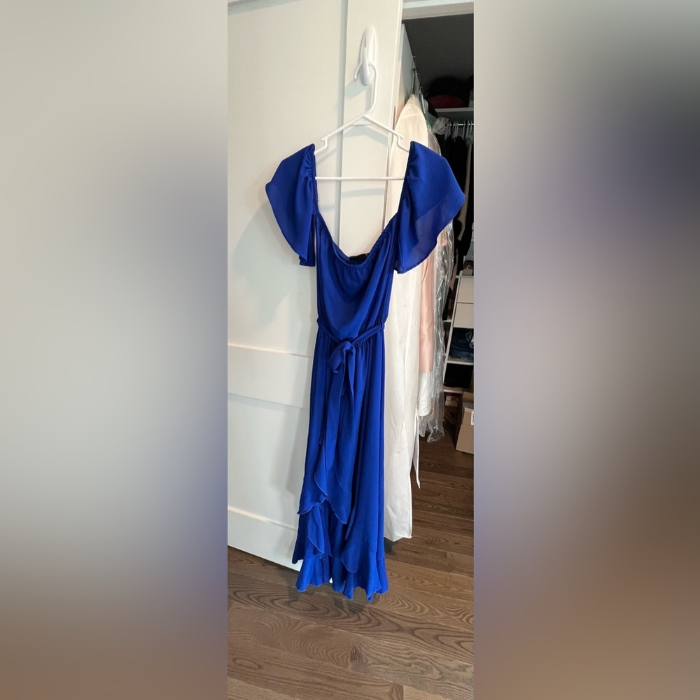 Vici - royal blue dress with ruffle slit.